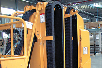 Grove Manlift med energikæde på meget begrænset plads