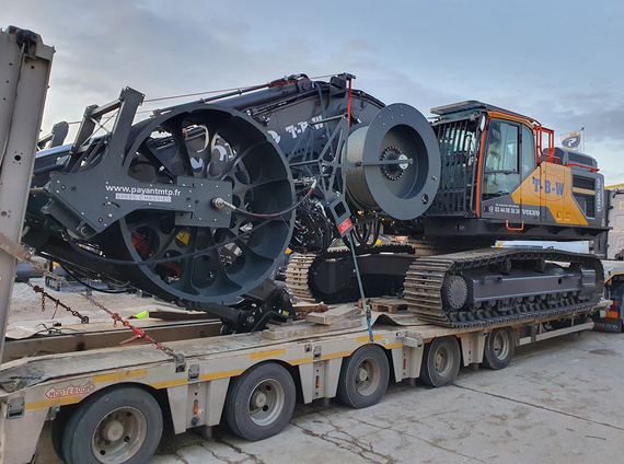 Excavator with pulley module in transport position