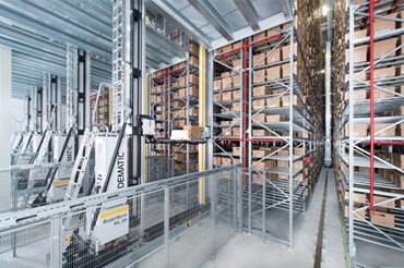 DEMATIC lagerplukningssystem med igus® guidelok-føringsrende